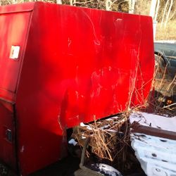 Behind truck cab backpack toolbox