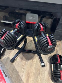 Bowflex dumbbells & Stand.View the comment below