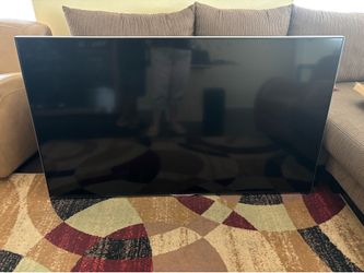 70” TV with TV mount/Not a smart Tv