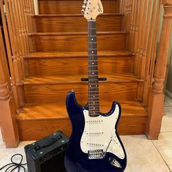 Squier Stratocaster (Mint) w/ Peavey Amp