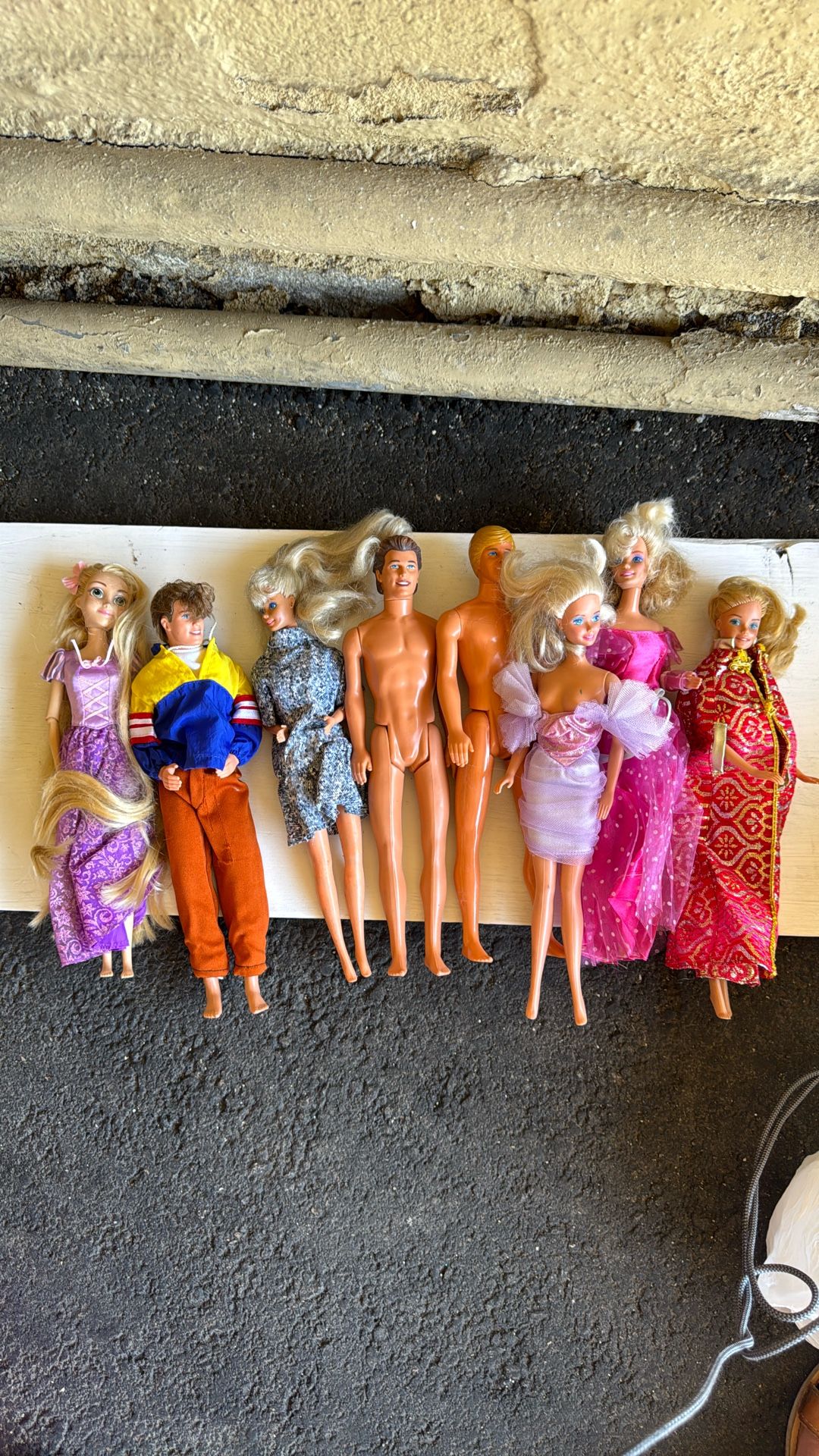 Old Barbies and Kens, all for 35