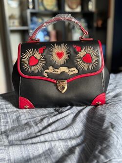Black Satchel Handbag with Embroidered Heart Design by Banned