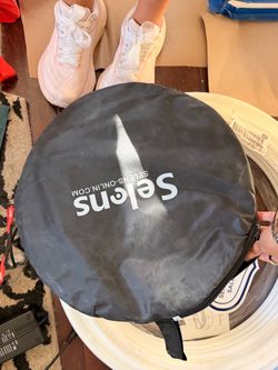 Selens photography reflector, still in bag