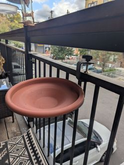 Mounted bird bath