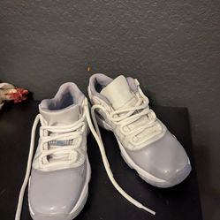 Nike Air Jordan 11 Retro Low in Cement Grey Sneakers