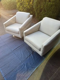 CHAIRS, MORONI INC-LEATHER, SWIVEL, A PAIR.