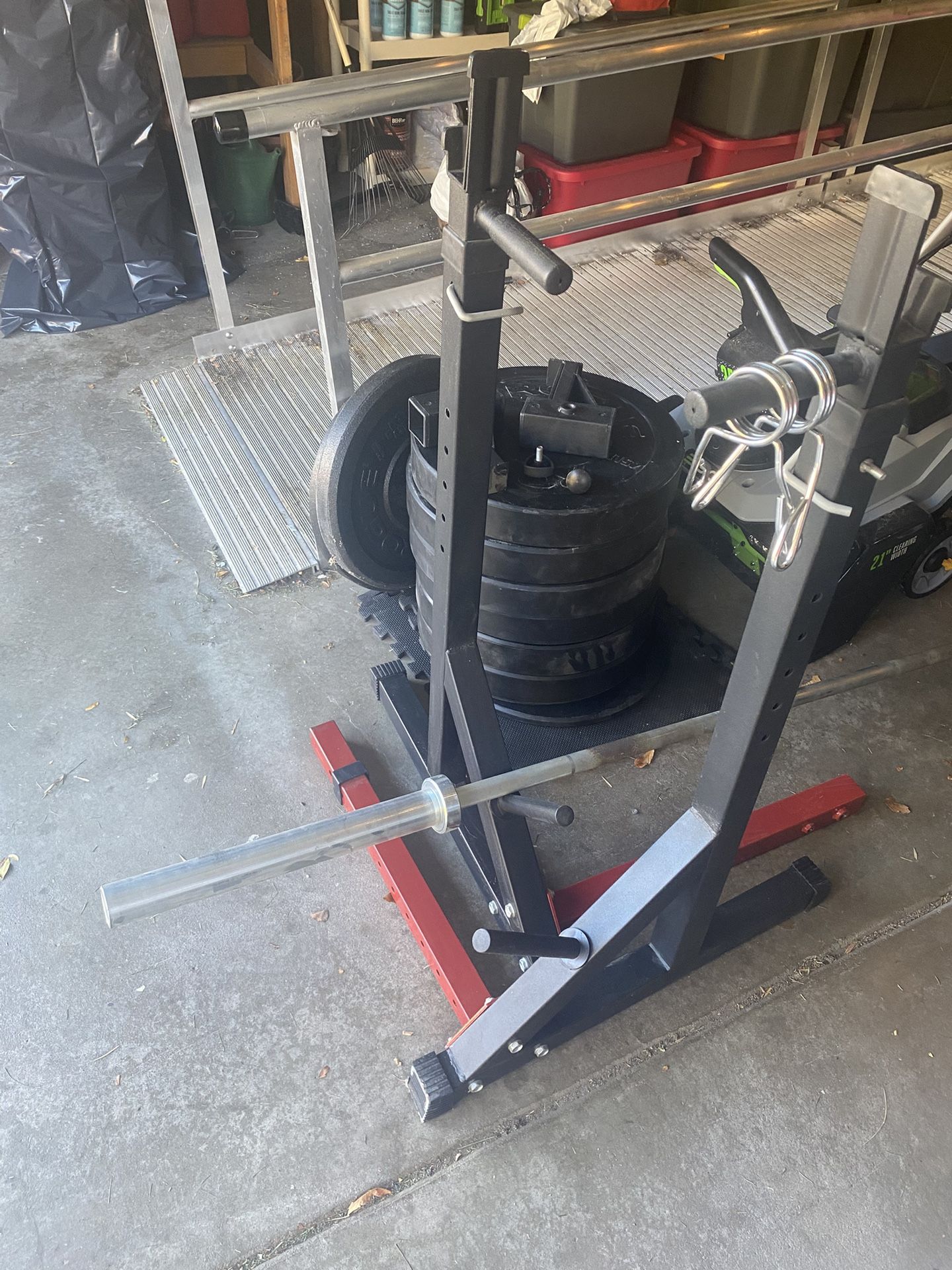 Simple Squat/Bench Rack + Rogue 45lb Barbell + 3 Pairs 45lb Plates + 1 Pair 25lb and 10lb Bumper Plates