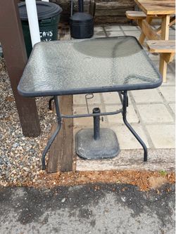 Outdoor table and umbrella base