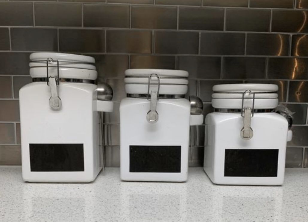 Set of three white kitchen canisters