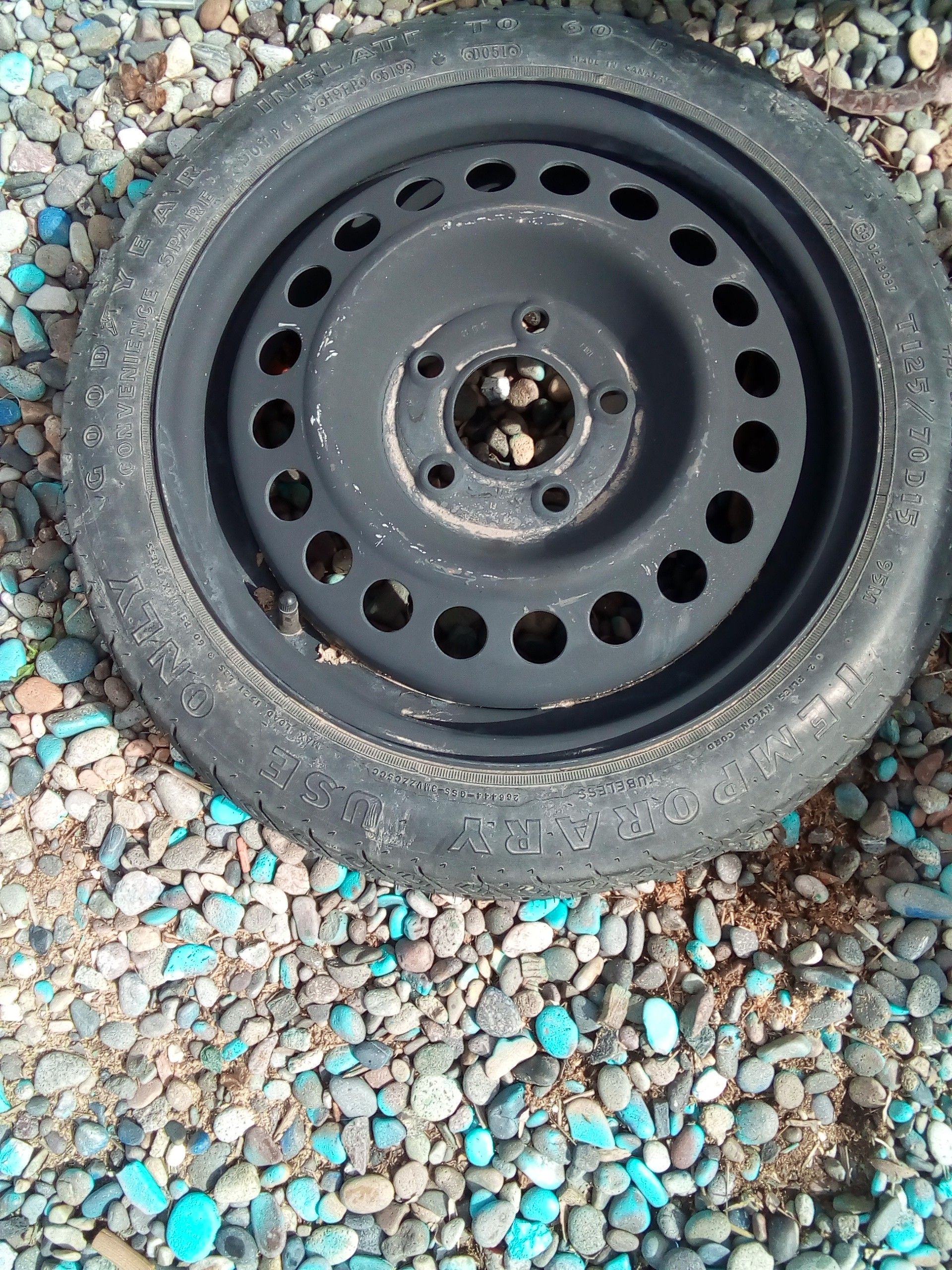 Donut spare , tire in great shape 5 lug