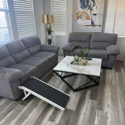 Selling two piece grey couch