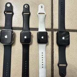 FIRM PRICE - 4 Apple Watches, 4 Brand New USB C Fast Chargers, 6 Cases, Extra Band