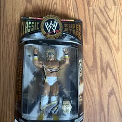 WWE CLASSIC SUPERSTARS ULTIMATE WARRIOR Collector SERIES 16 Figure New in the box