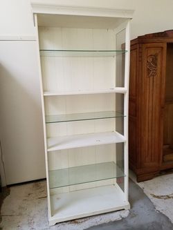 7 foot cabinet with glass shelves