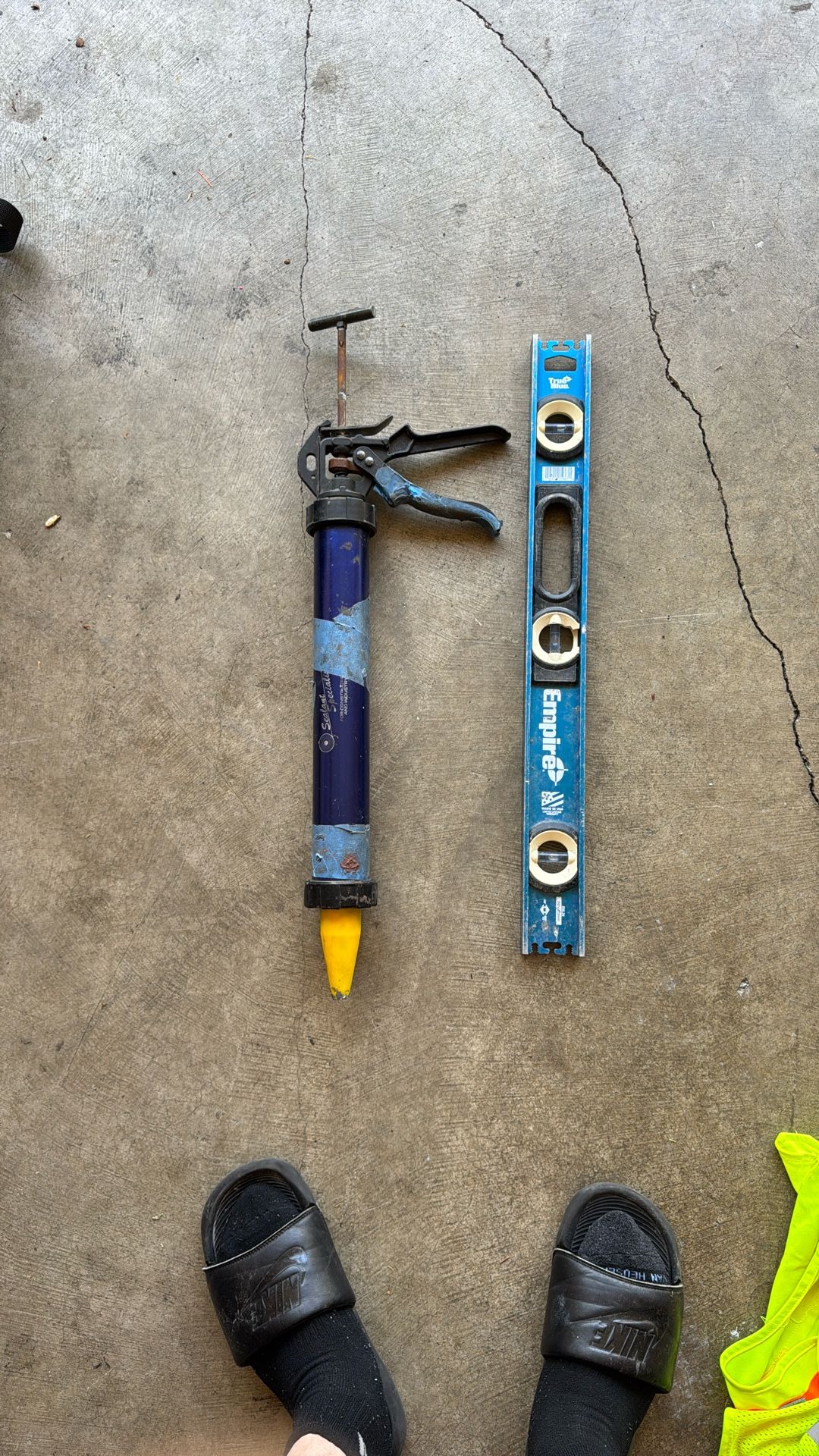 Caulking, Gun And 2 Foot Level
