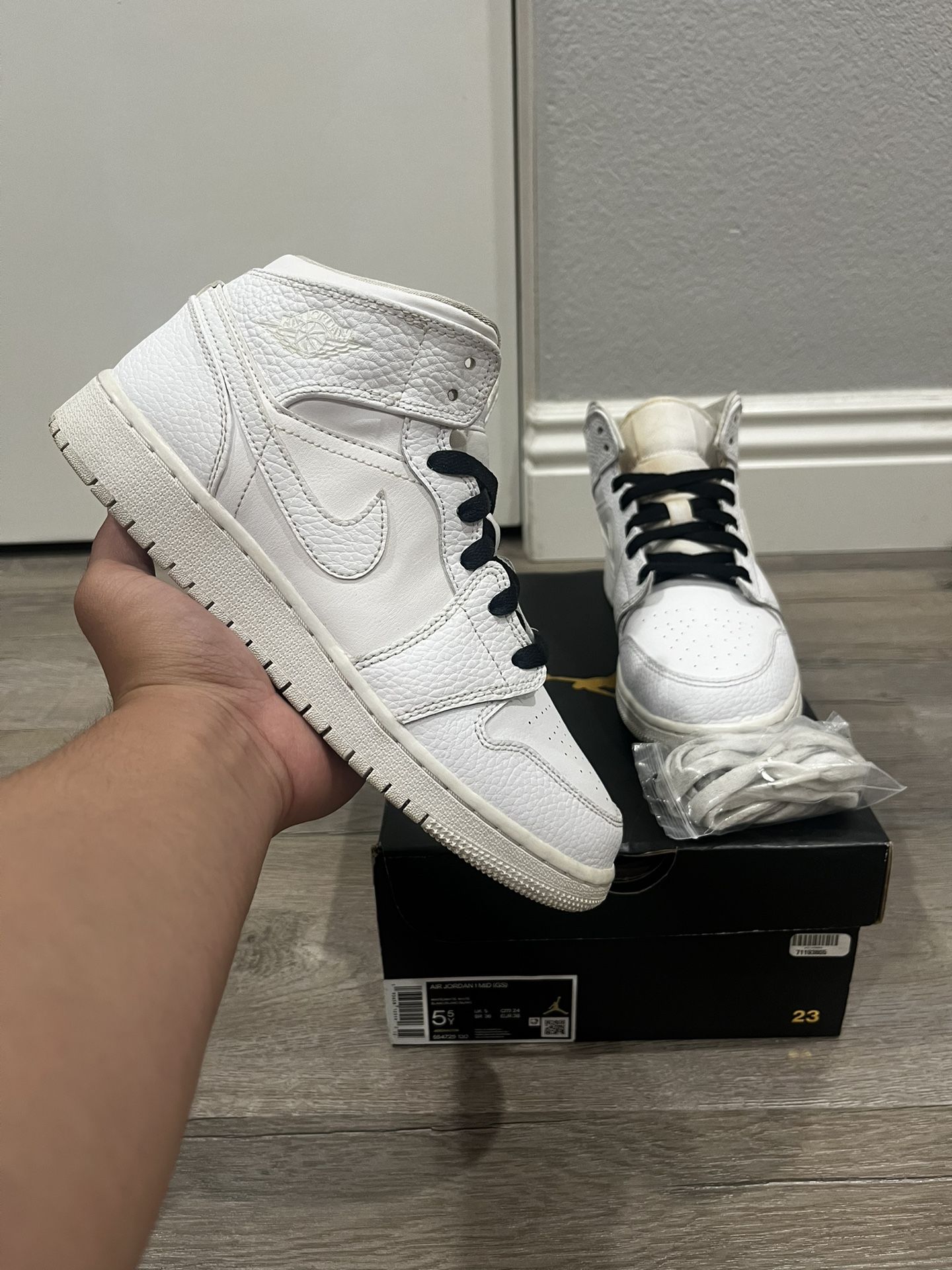 Jordan 1 Mid Triple White