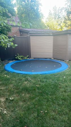 in-ground trampoline (no support stands)
