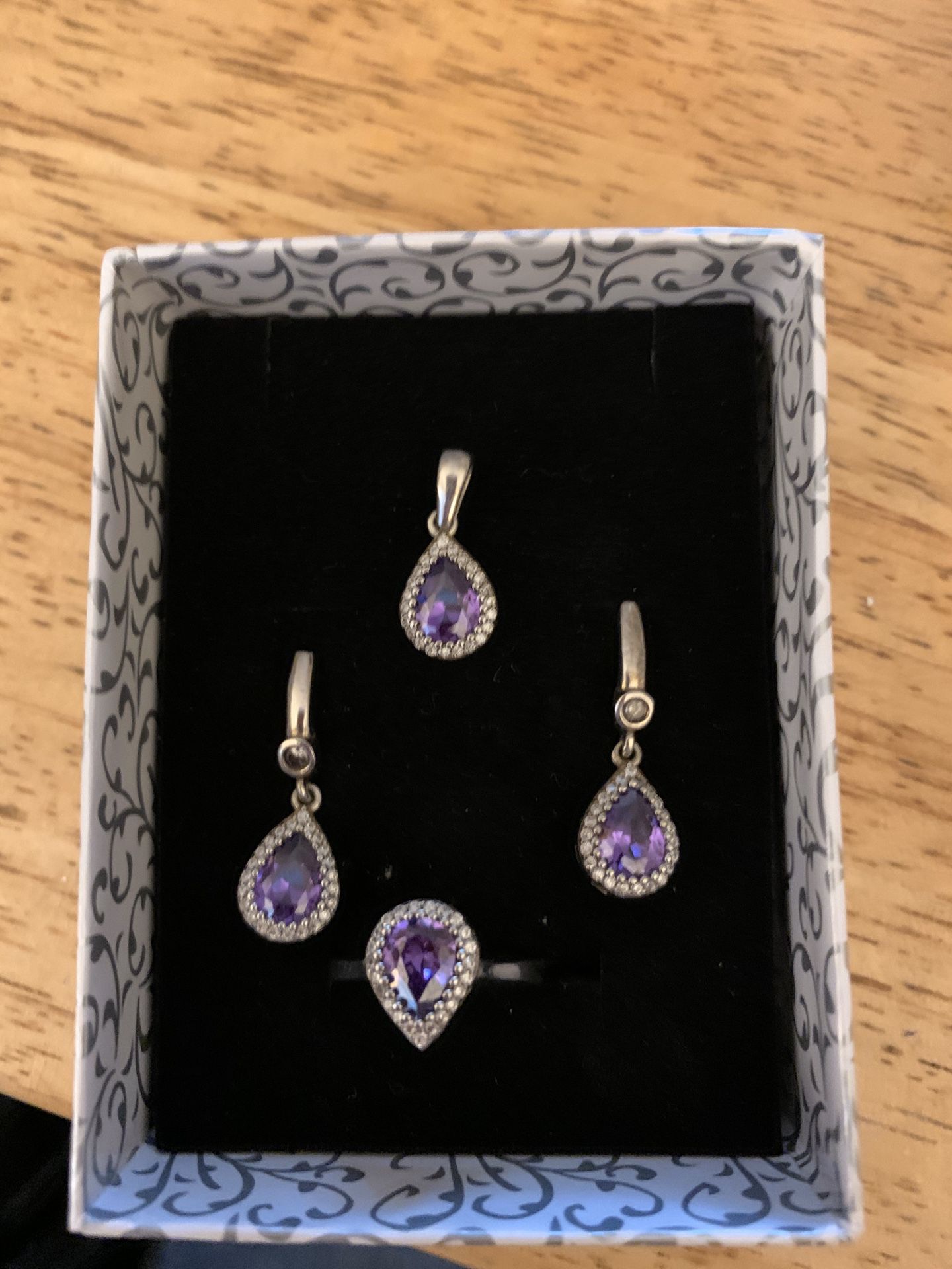 Amethyst earrings, ring, and pendent