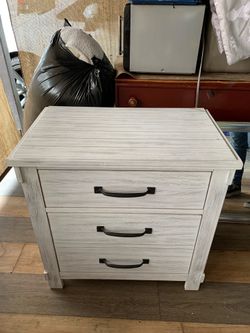 Bedside dresser with hidden drawer