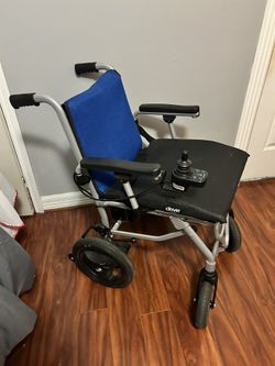Electric Wheelchair (Charger and Foot Rests Included)