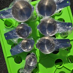 Brand New,  Stainless Steel Measuring Cups 