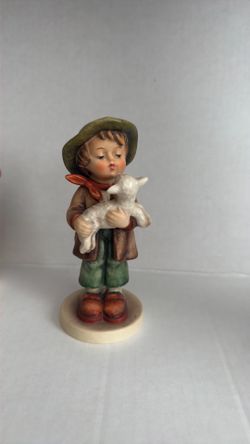 This is a Goebel Hummel figurine titled "The Lost Sheep" (model #68).