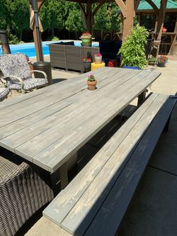 Outdoor dining table and bench and end chairs
