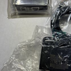 Polycom OBi300 or OBi302 Voice Adapter, which is an Analog Telephone Adapter (ATA)