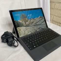 Microsoft Surface Pro 7  Windows 11 CRACKED GLASS CORNER BUT  Working  Fine Charger INCLUDED      