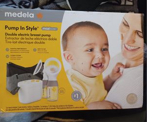 New In Box Breast Pump W Accessories