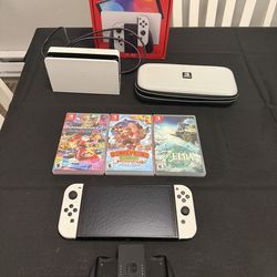 Nintendo Switch OLED with 3 Games And Case