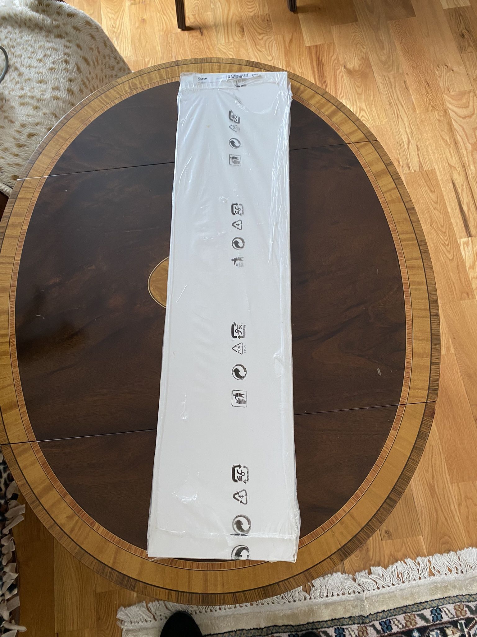 White wooden shelf. New. Never used. Still sealed in original packaging. 31.1/8 x 7.1/2 x 3/4 in.