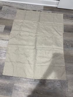 Set of 4 brand new beige window balances/curtains. Each is 16 x 34”