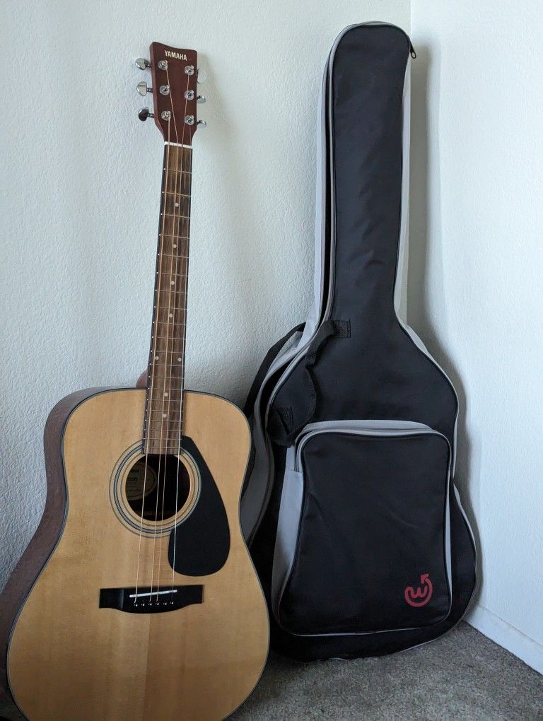 Acoustic Guitar with Case And Strings 