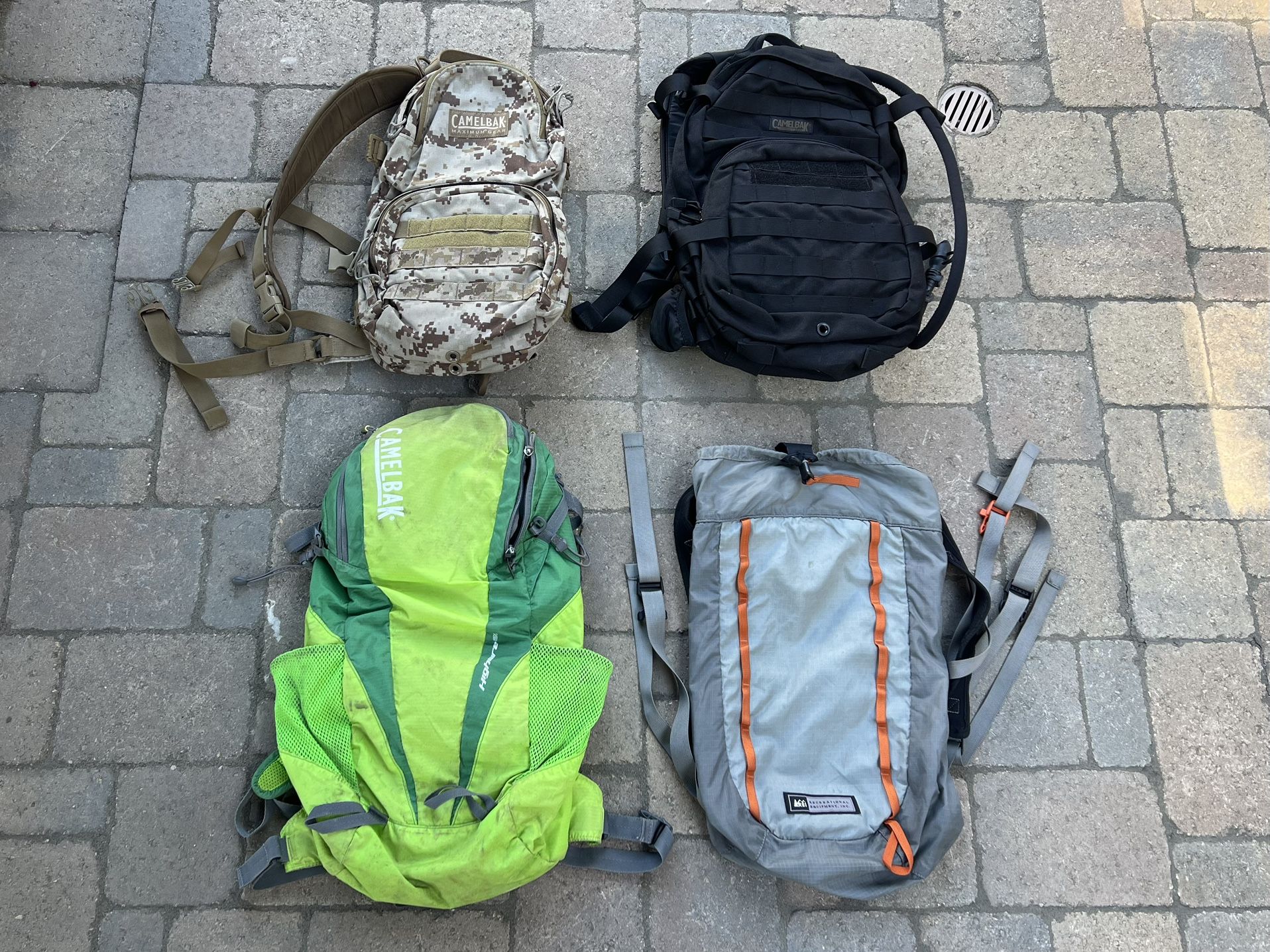 Lot of 4 Hydration Packs – CamelBak & REI (Includes Bladders) – $120