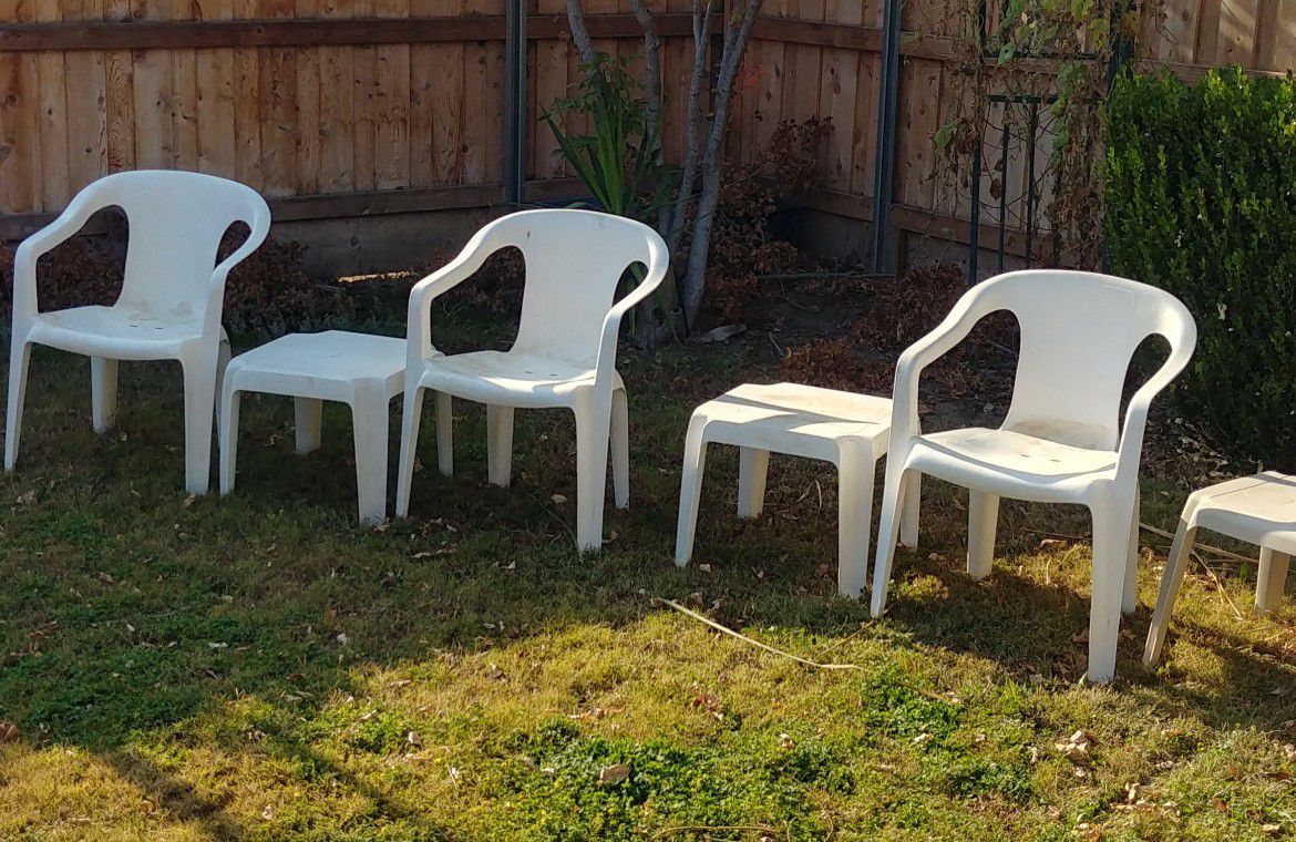 Five plastic Chairs Three End Tables
