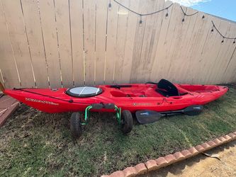 Triumph 13.0 kayak, Harmony sea passage paddle, and wheels