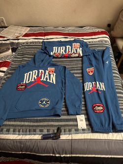 Brand new Jordan sweatsuits top bottom and tshirt to match (2sets) with tags