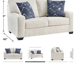 Brand new Ashley furniture love seat