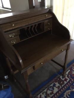 Antique collectible table . Long 31 inches width 22.5 inches height 42 inches