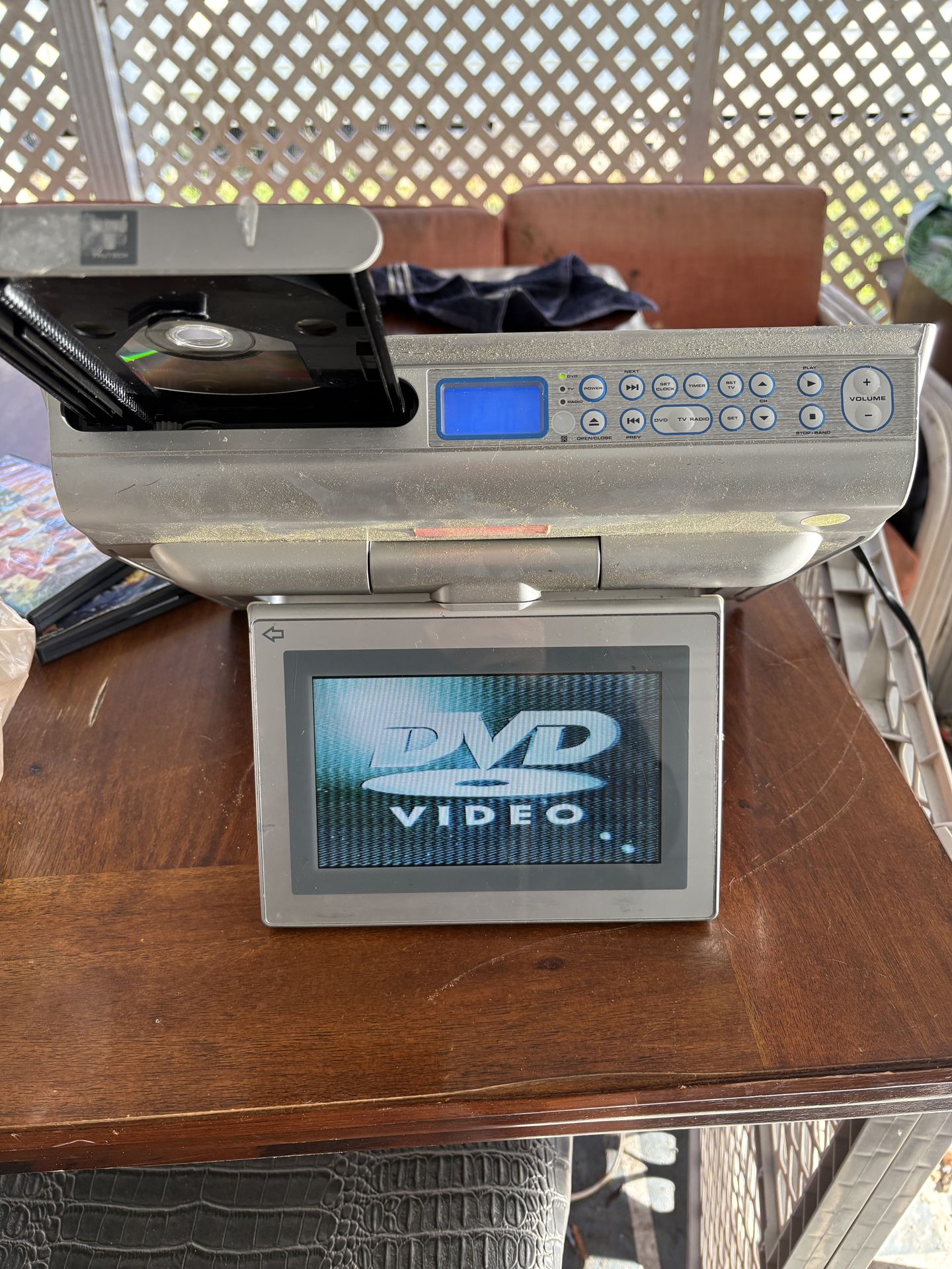 Portable DVD player/radio/TV with 16 Disney DVDs Portable DVD player/radio/TV with 16 Disney DVDs