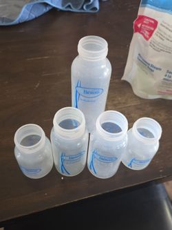 Dr Brown/Tommee Tippee bottles with all the parts and sterilized.