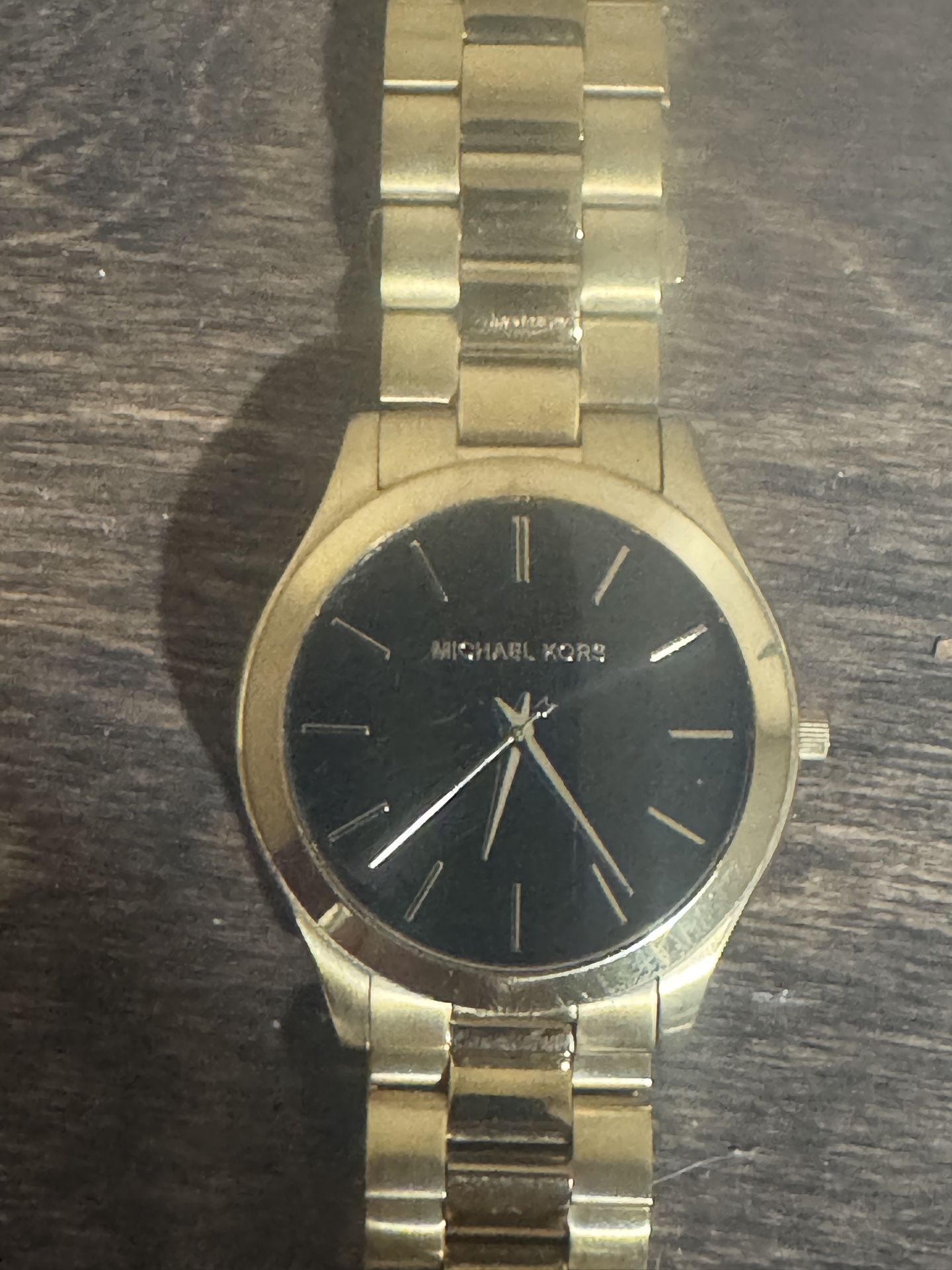 This is a Michael Kors 'Slim Runway' watch.