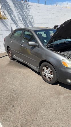 Whole Corolla for parts or drive