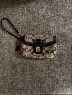 Coach legacy wristlet in brown