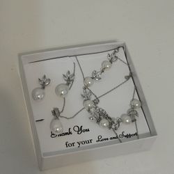 BRAND NEW. Necklace, earrings, and bracelet matching set. 