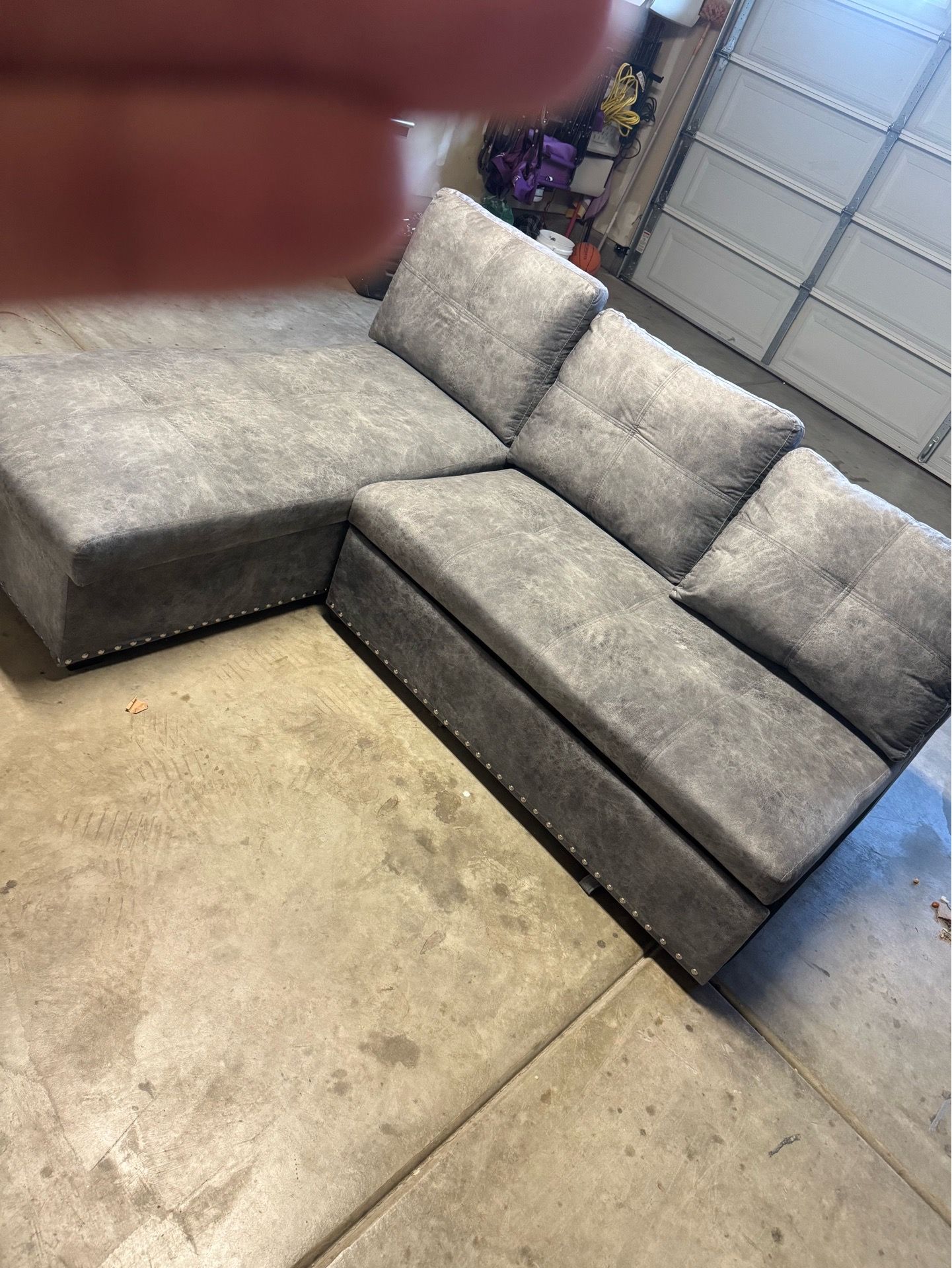 Grey L shape pull out sofa