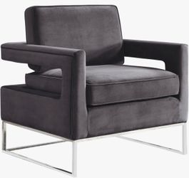 gray velvet accent chair with a chrome/stainless steel sled base.