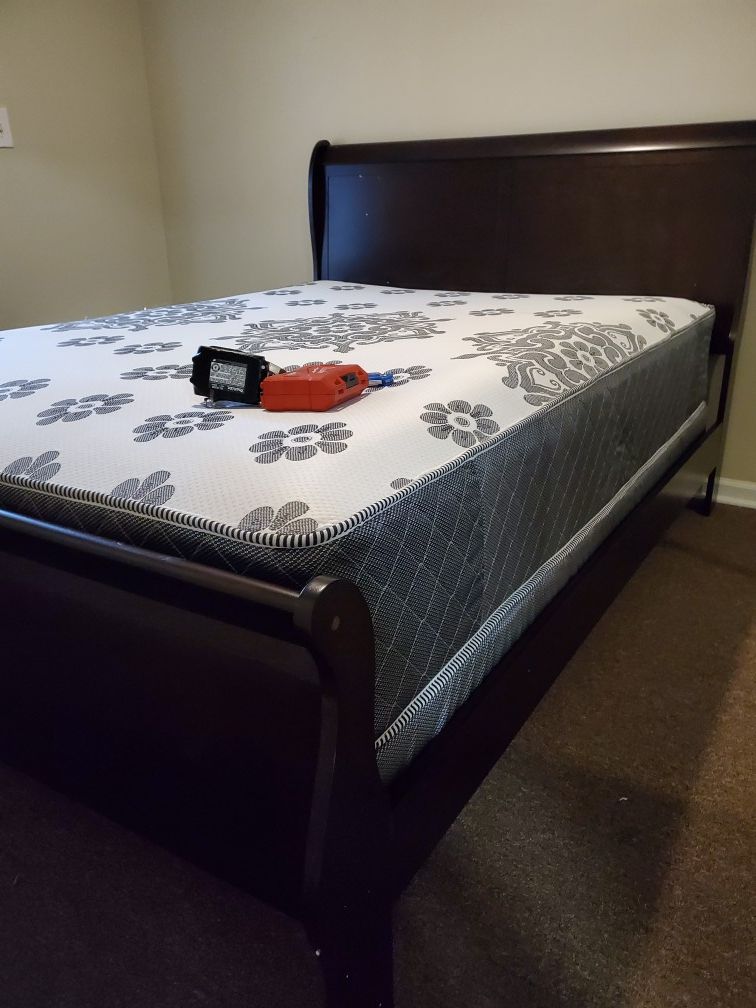 Brand new in box queen bed frame includes mattress and box spring