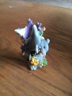 (2) Dolphin figurine candle holder